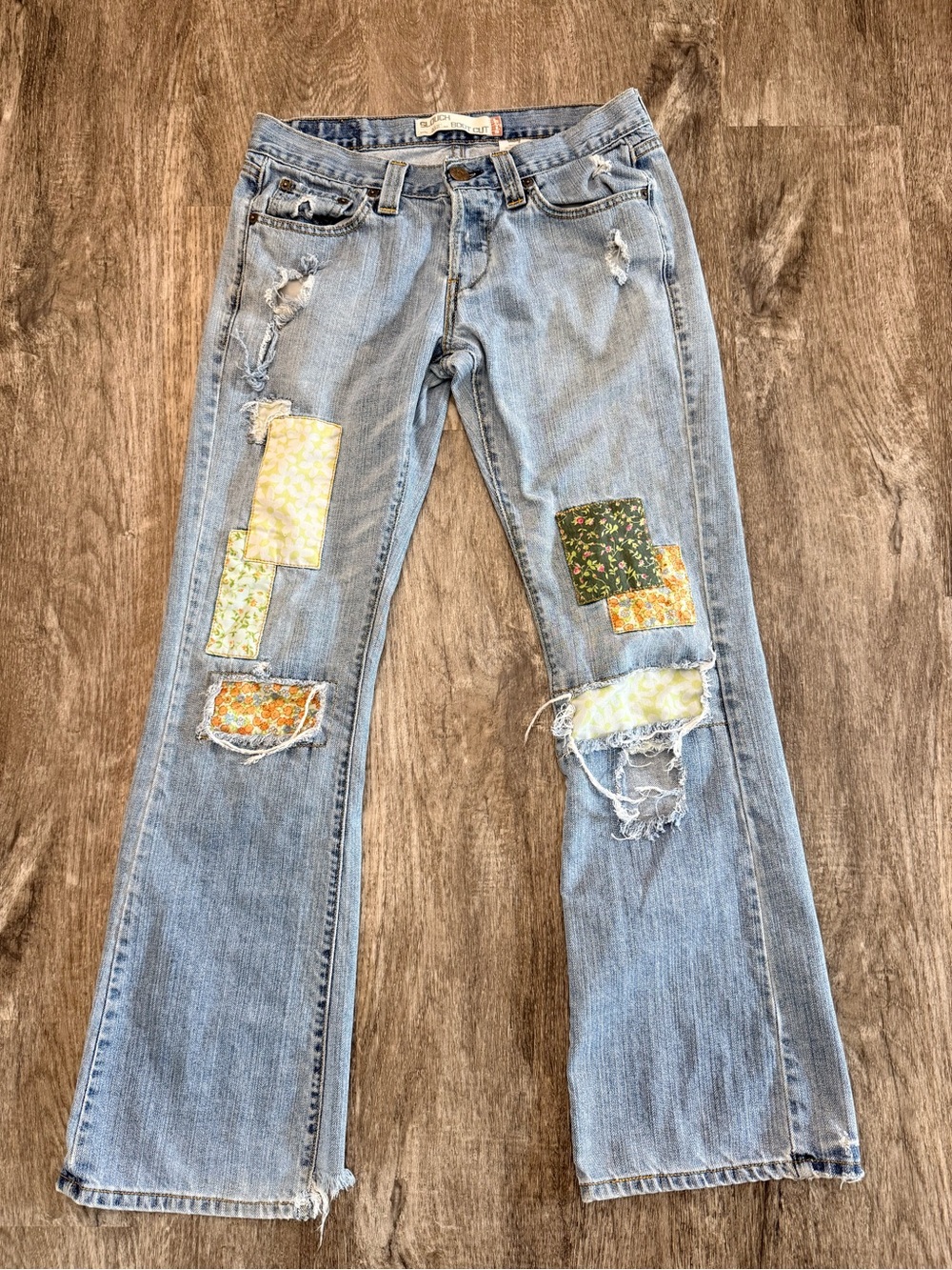 Levi’s 513 Y2K slouch bootcut patch button fly jean Distressed holes raw hem 7M